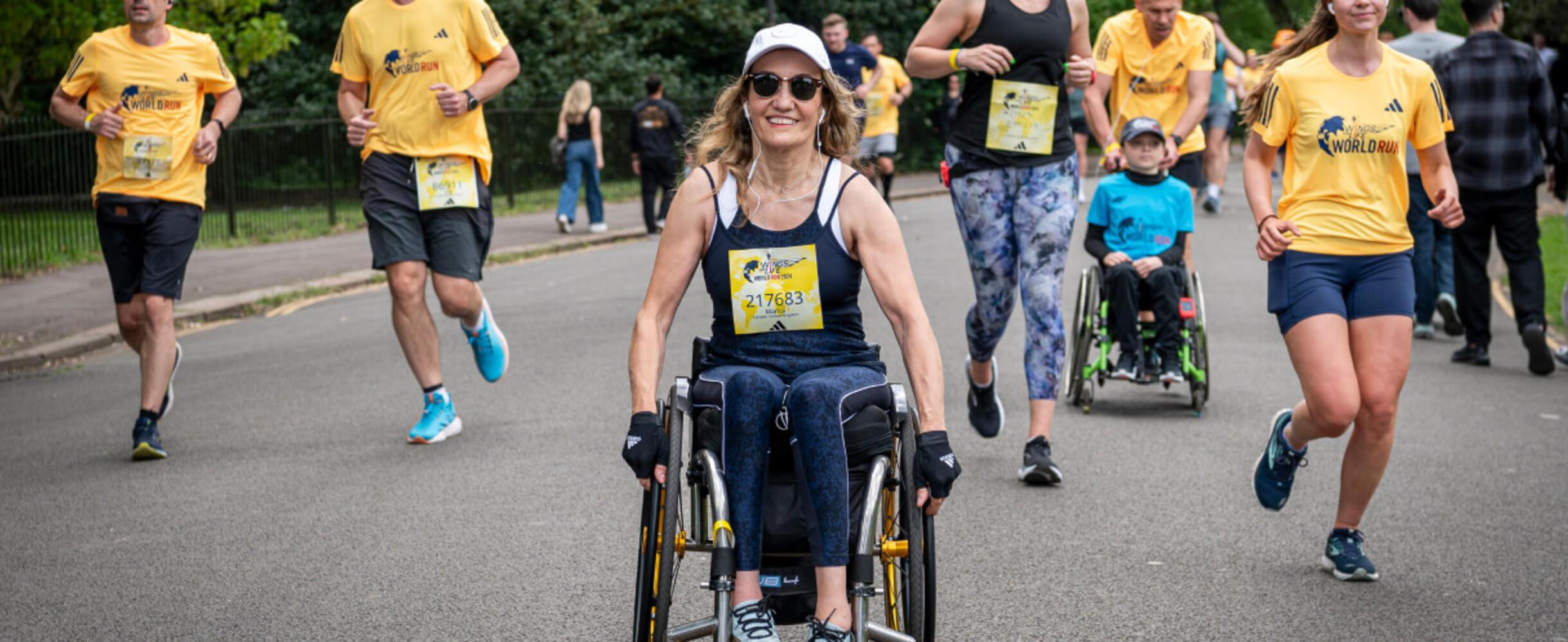 Participants in Wings for Life including wheelchair users