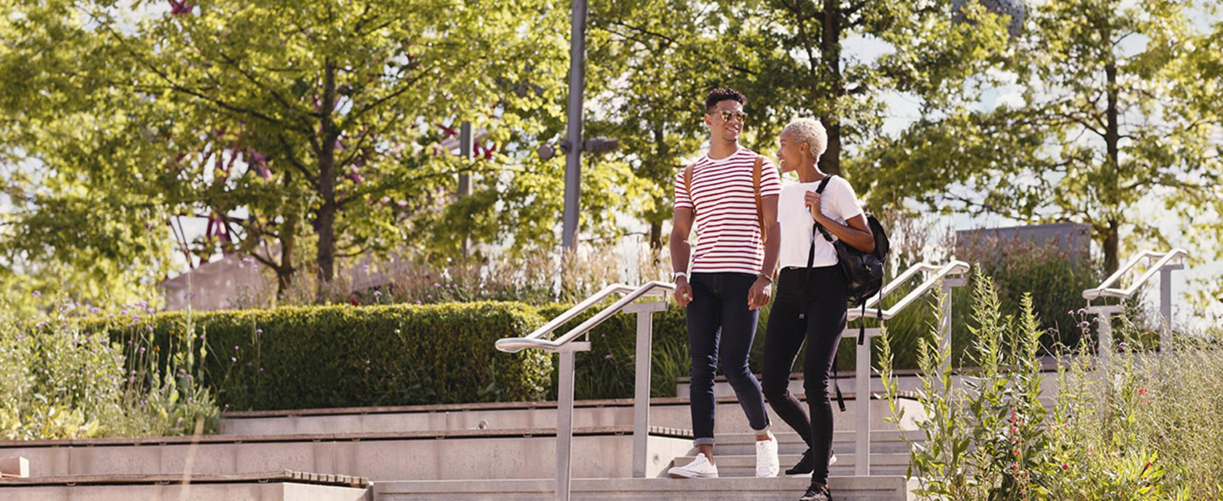 Couple walking in 2012 Gardens in summer