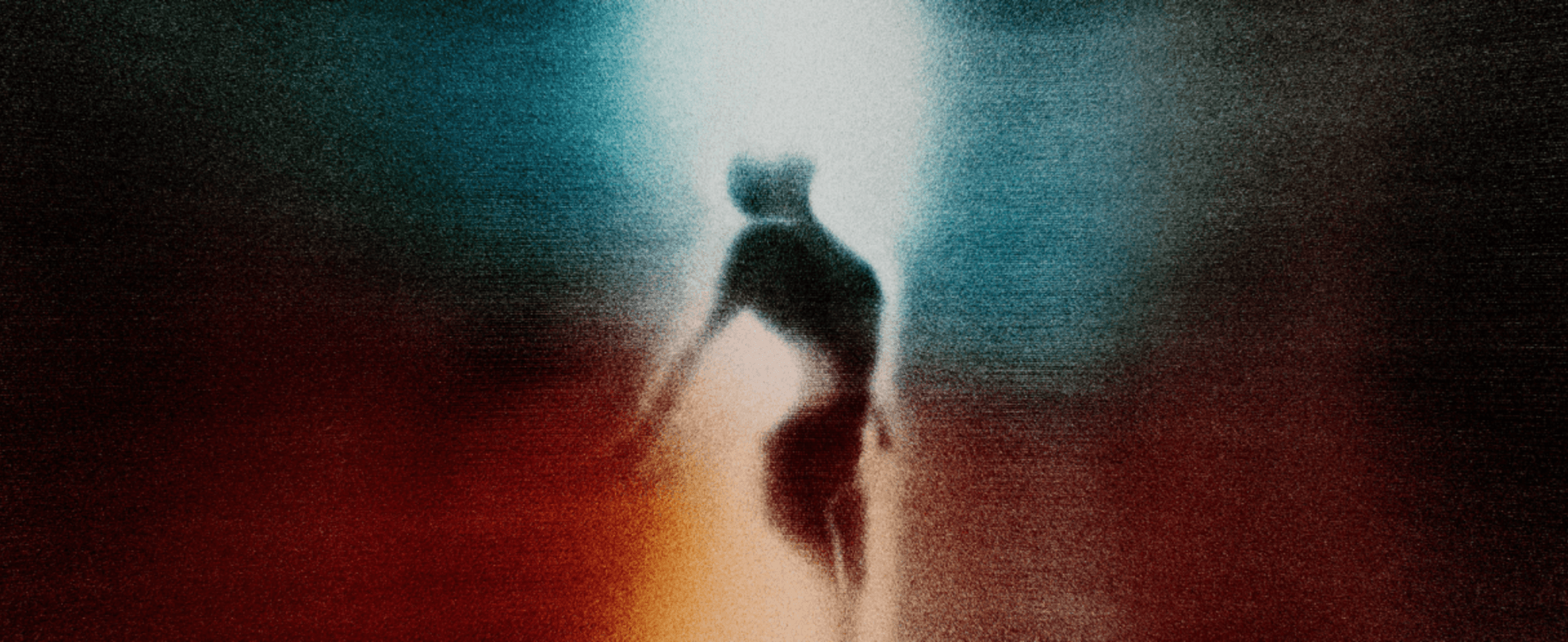 A Dancer looks up in light