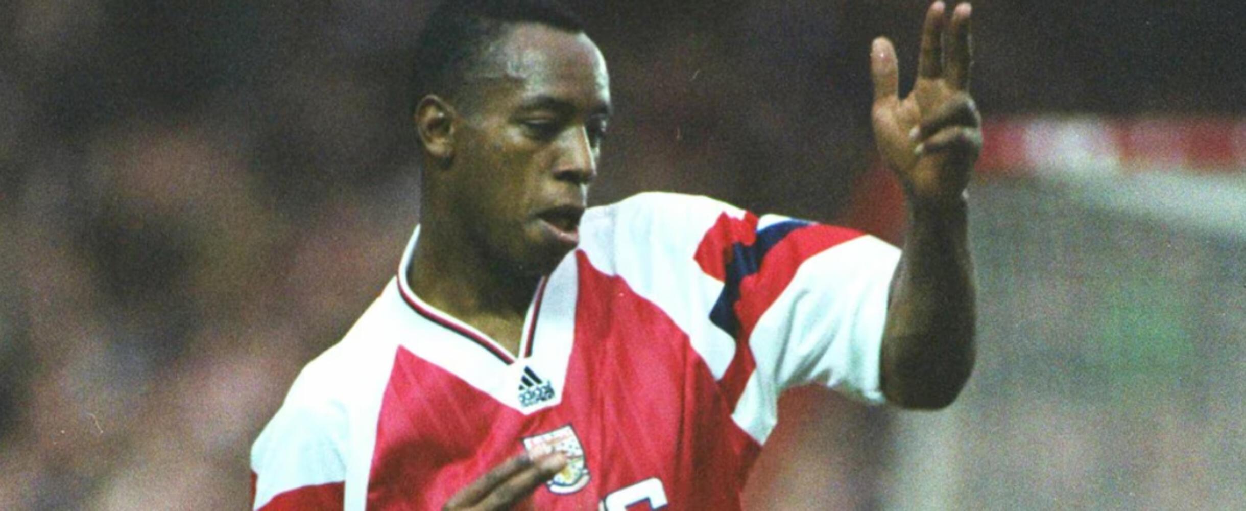 Ian Wright celebrates after scoring a goal