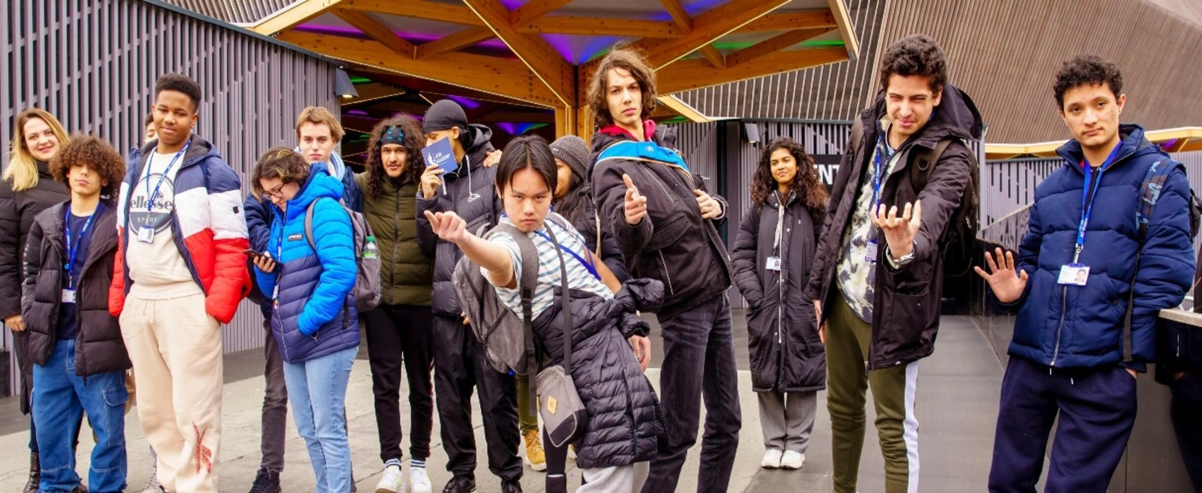 Students stand outside ABBA Voyage