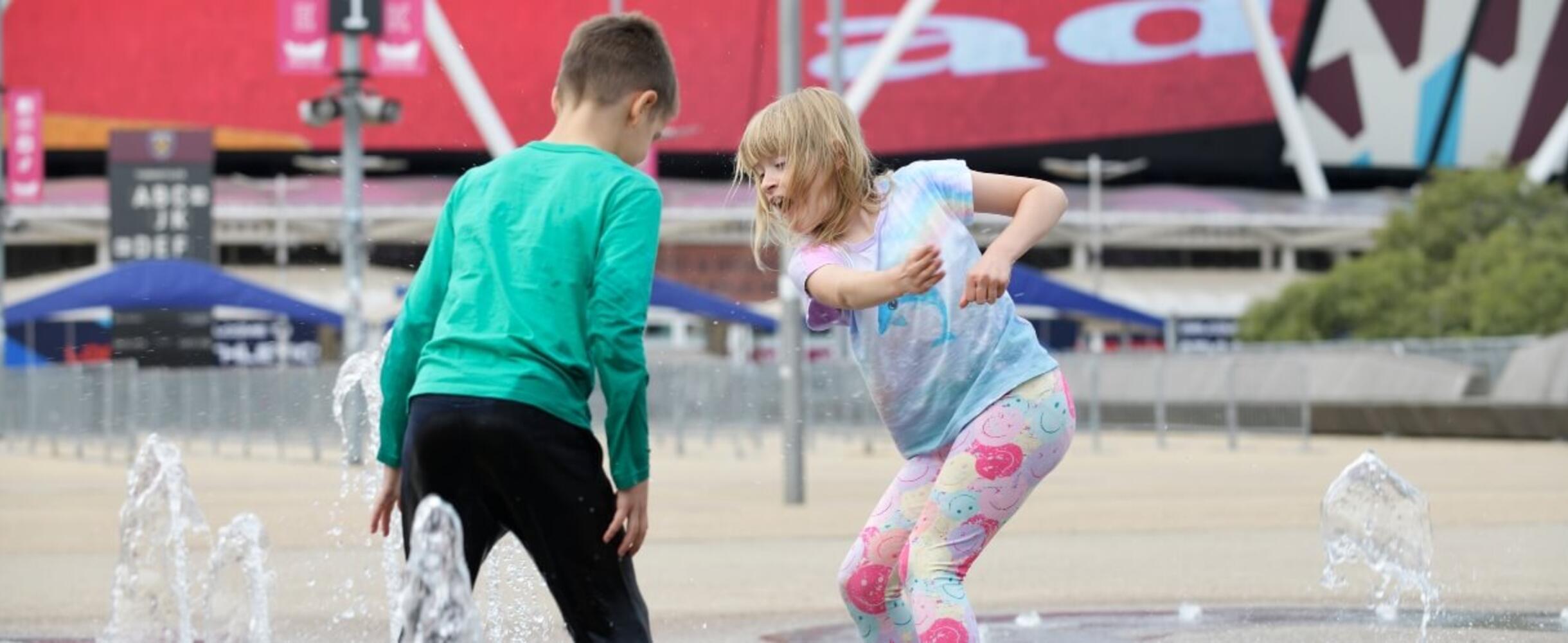 Children enjoying the fountains