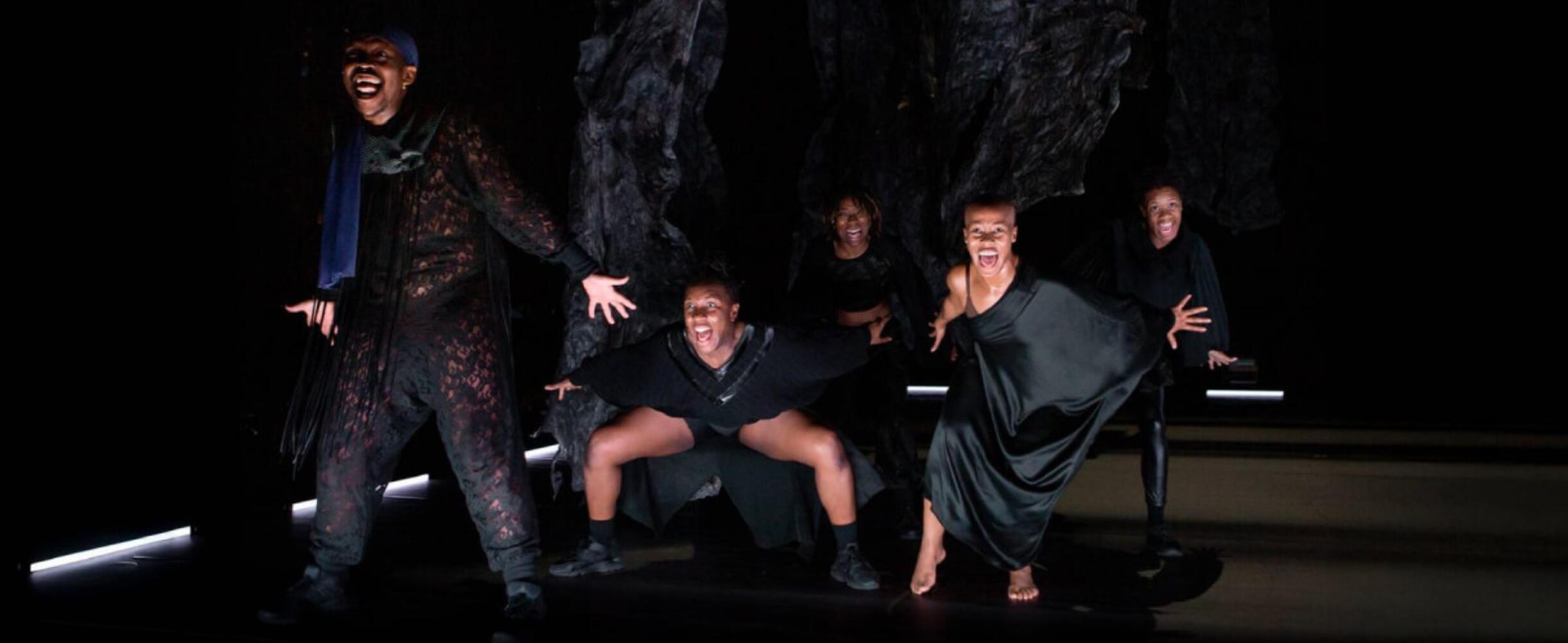Dancers in a dark space