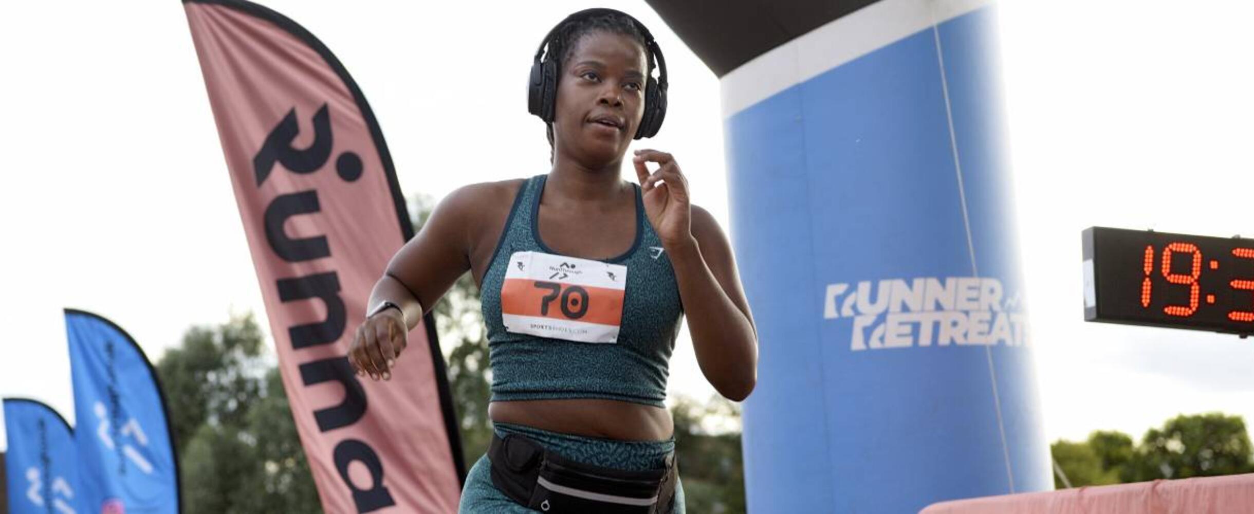 A runner takes part in a RunThrough event on Queen Elizabeth Olympic Park