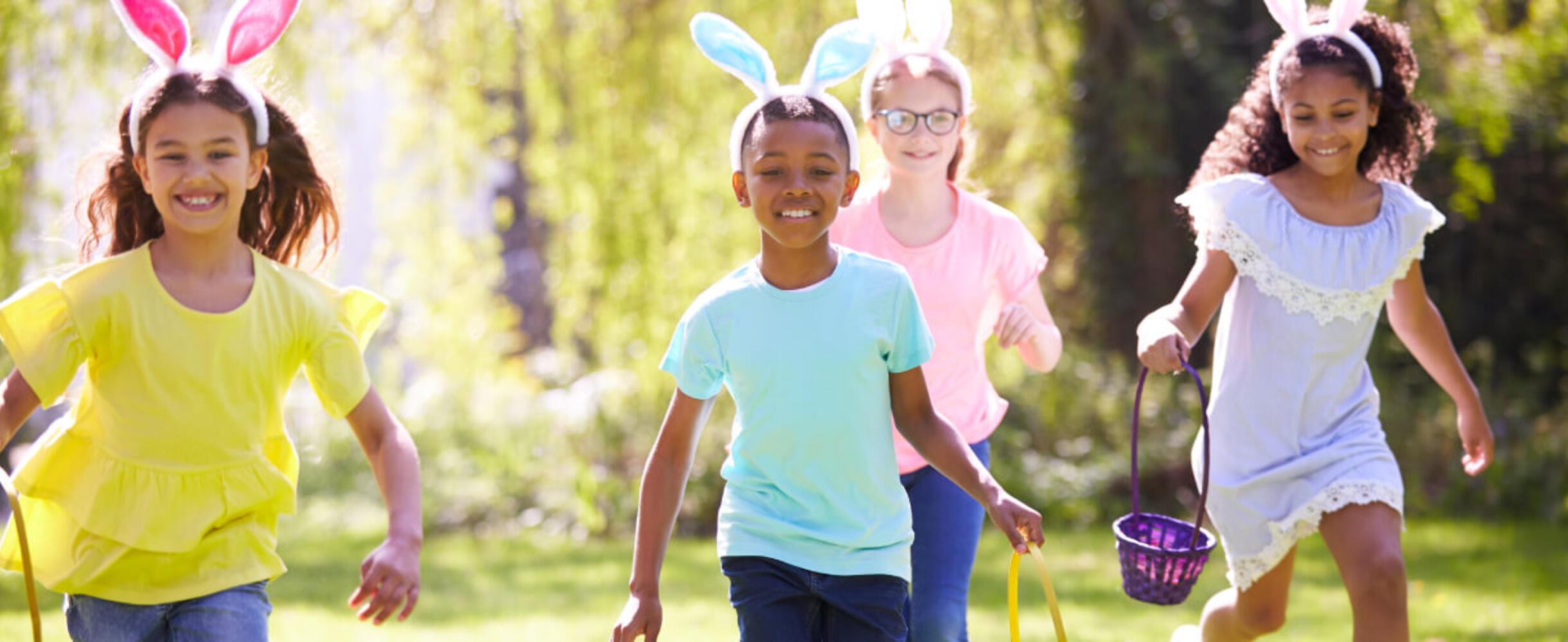 Kids running holding easter egg baskets