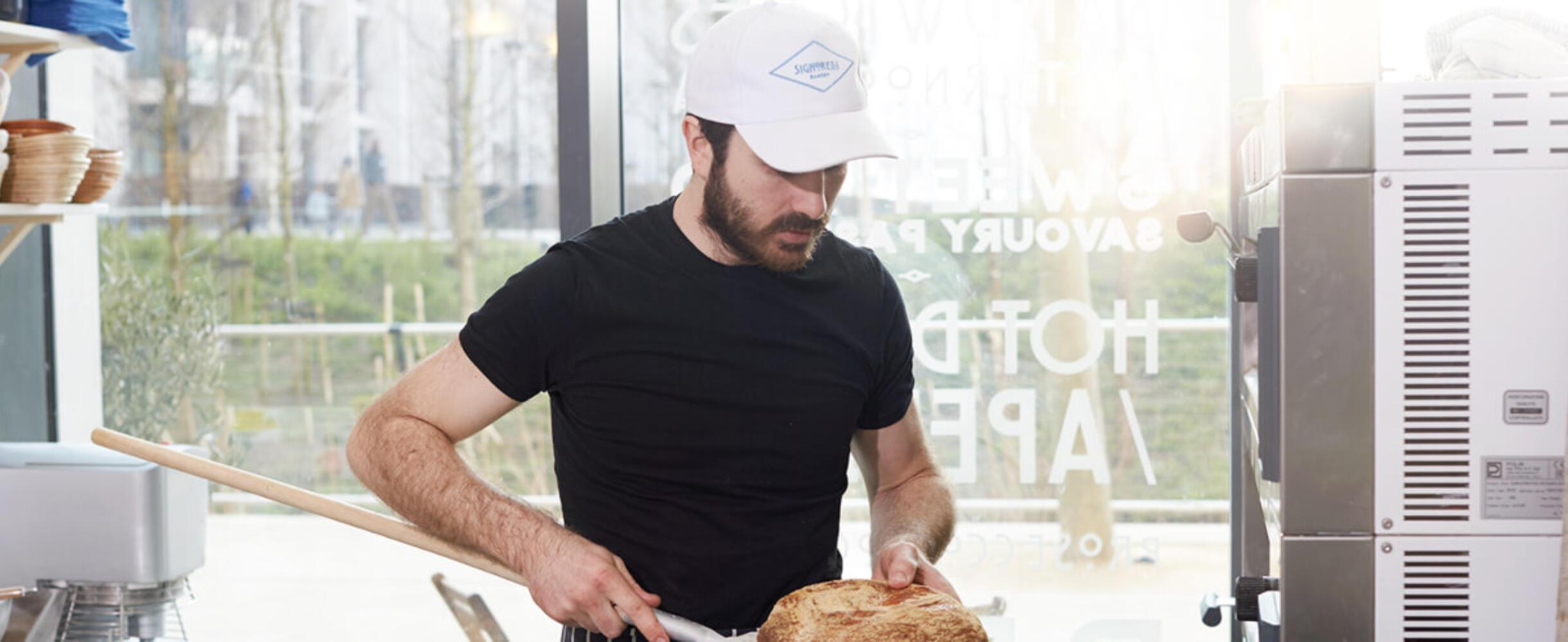 A baker working with bread