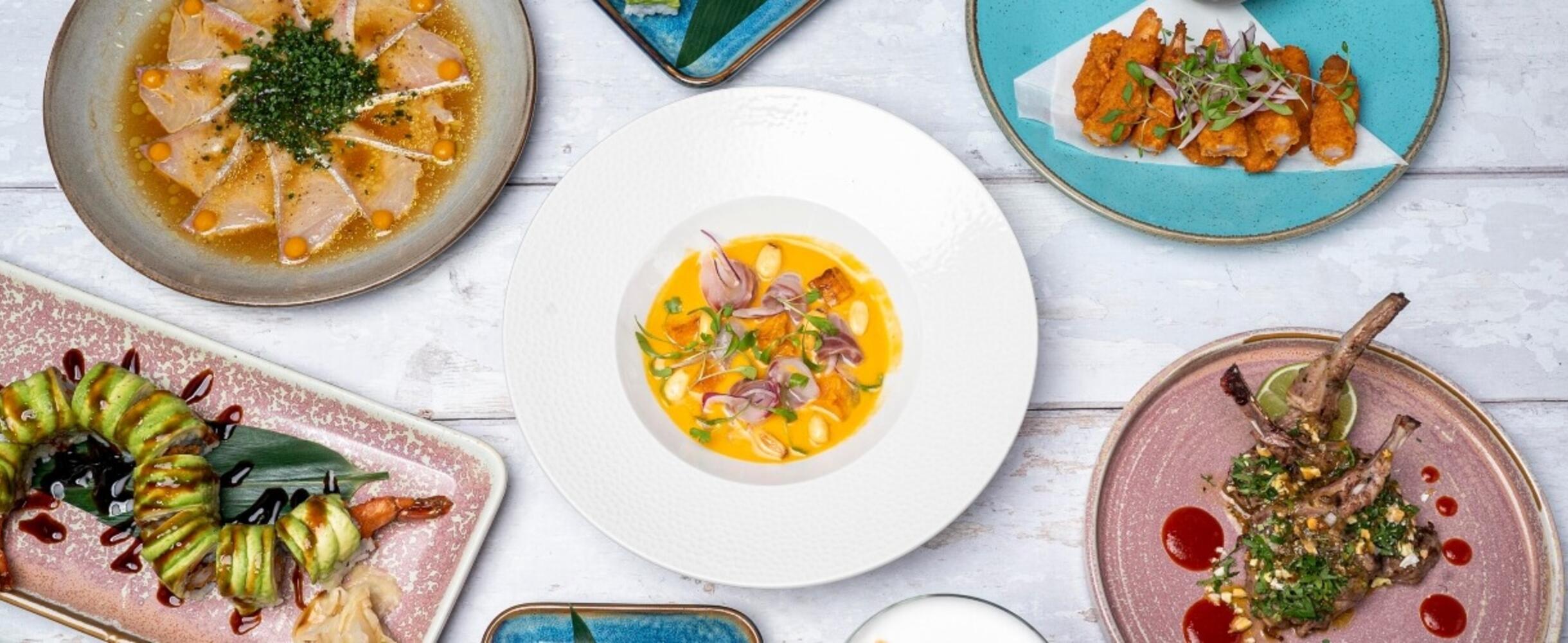 A selection of dishes at Bamboo Mat on a white background