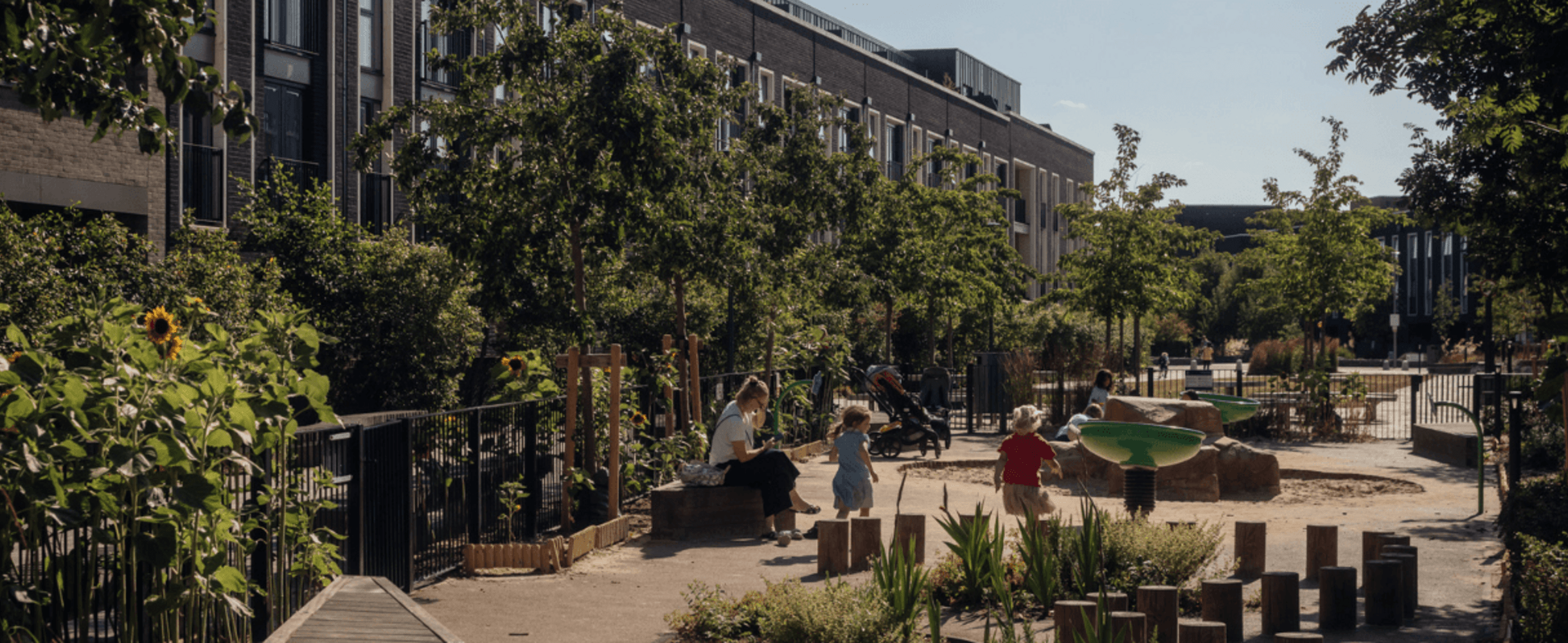 Children enjoying a neighbourhood playground on a sunny day