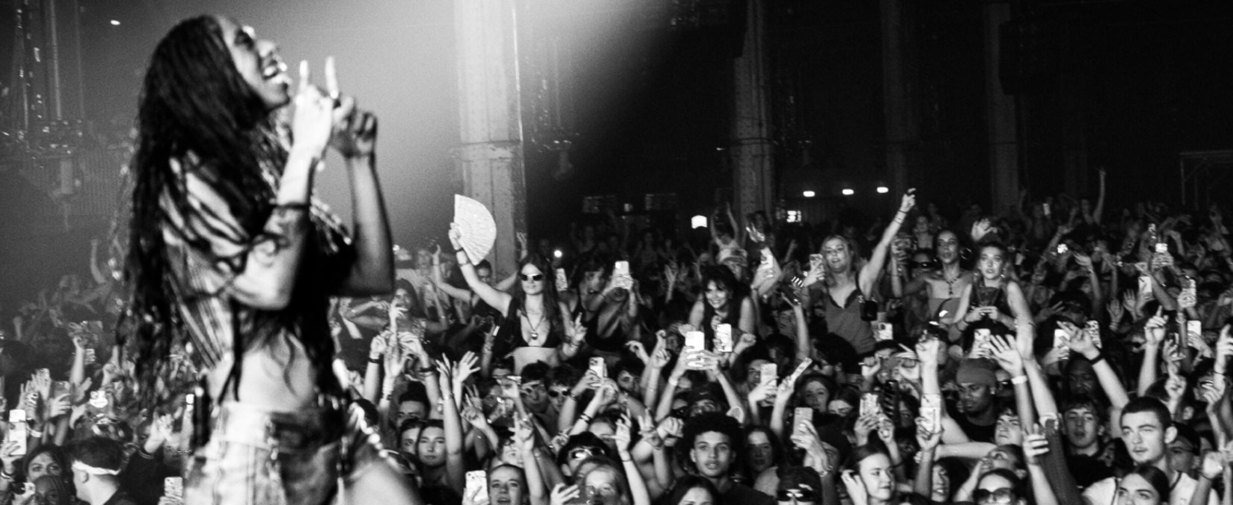 Musician on stage with a big audience