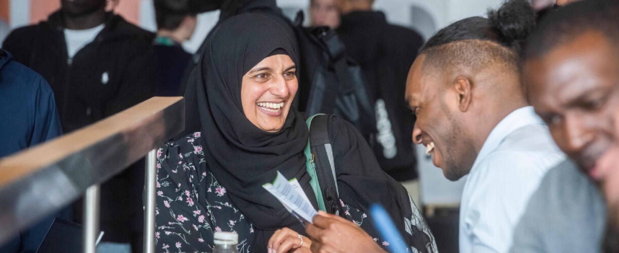A group of people at a Diversity in Tech event