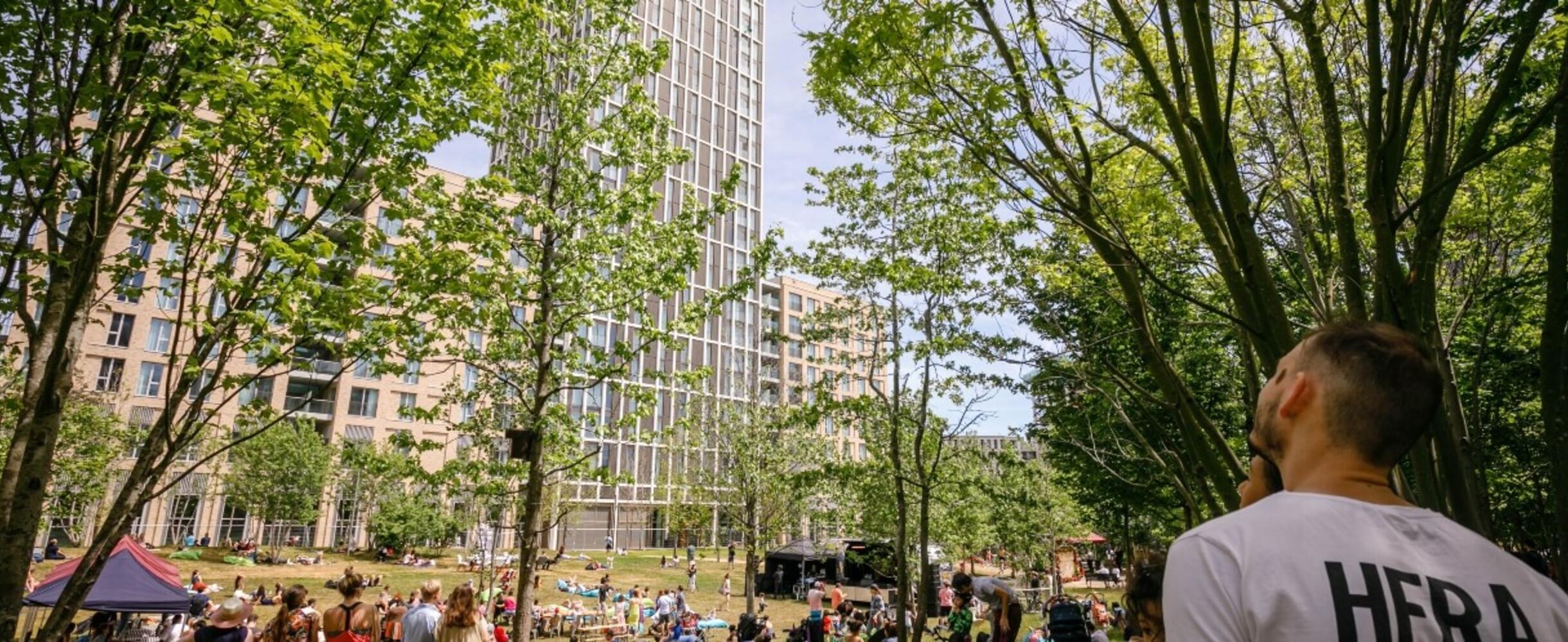 A community picnic outside East Village