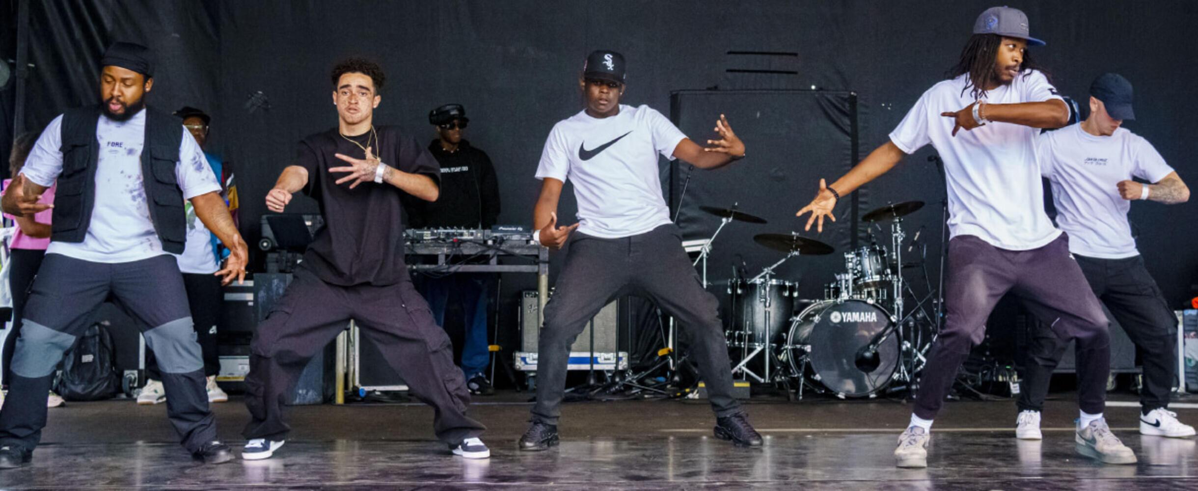 Dancers on stage at the Great Get Together