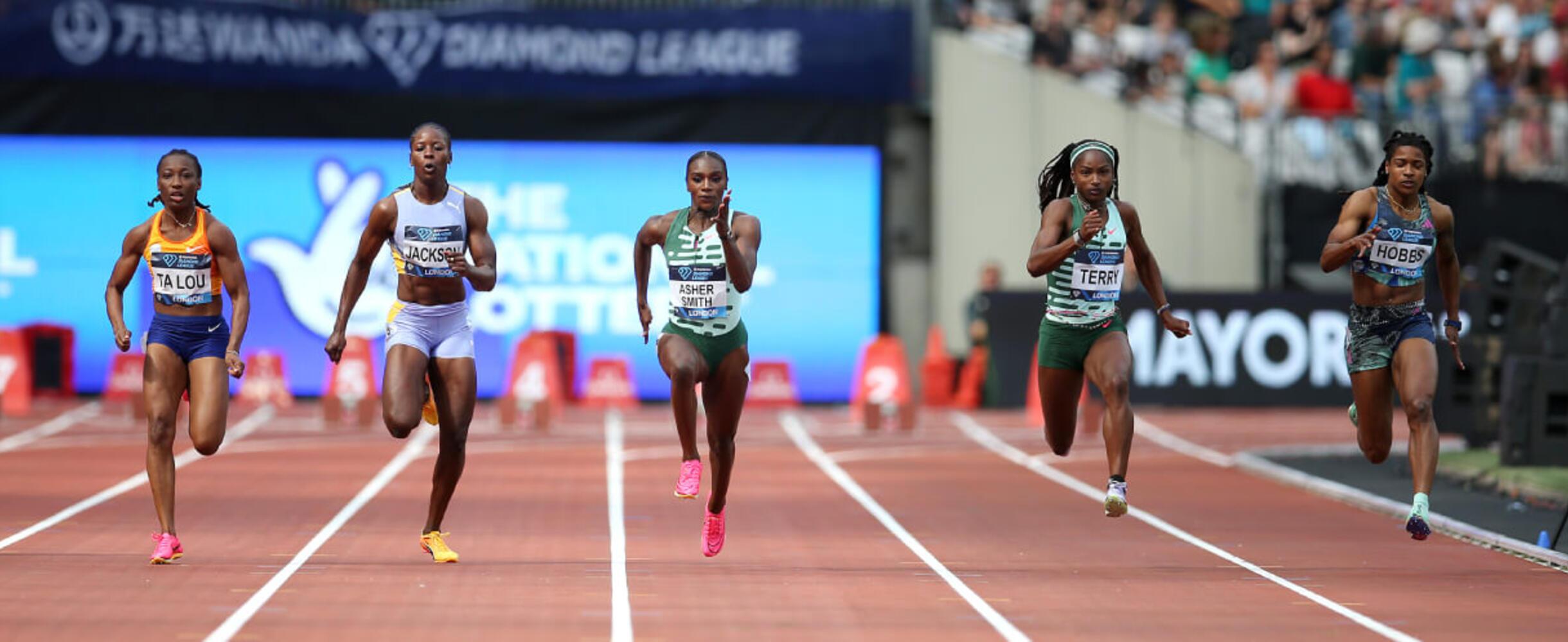 Five runners sprint for the finish line at London Stadium
