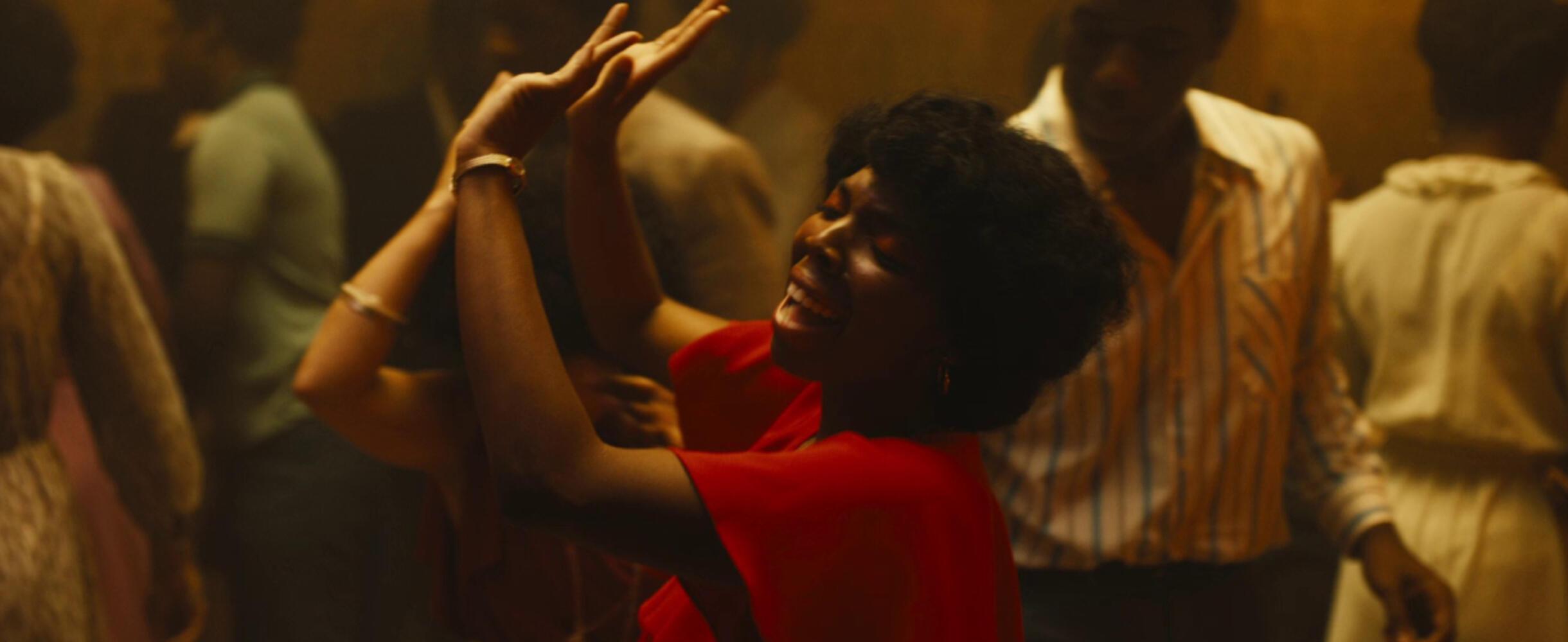 A group of people dance