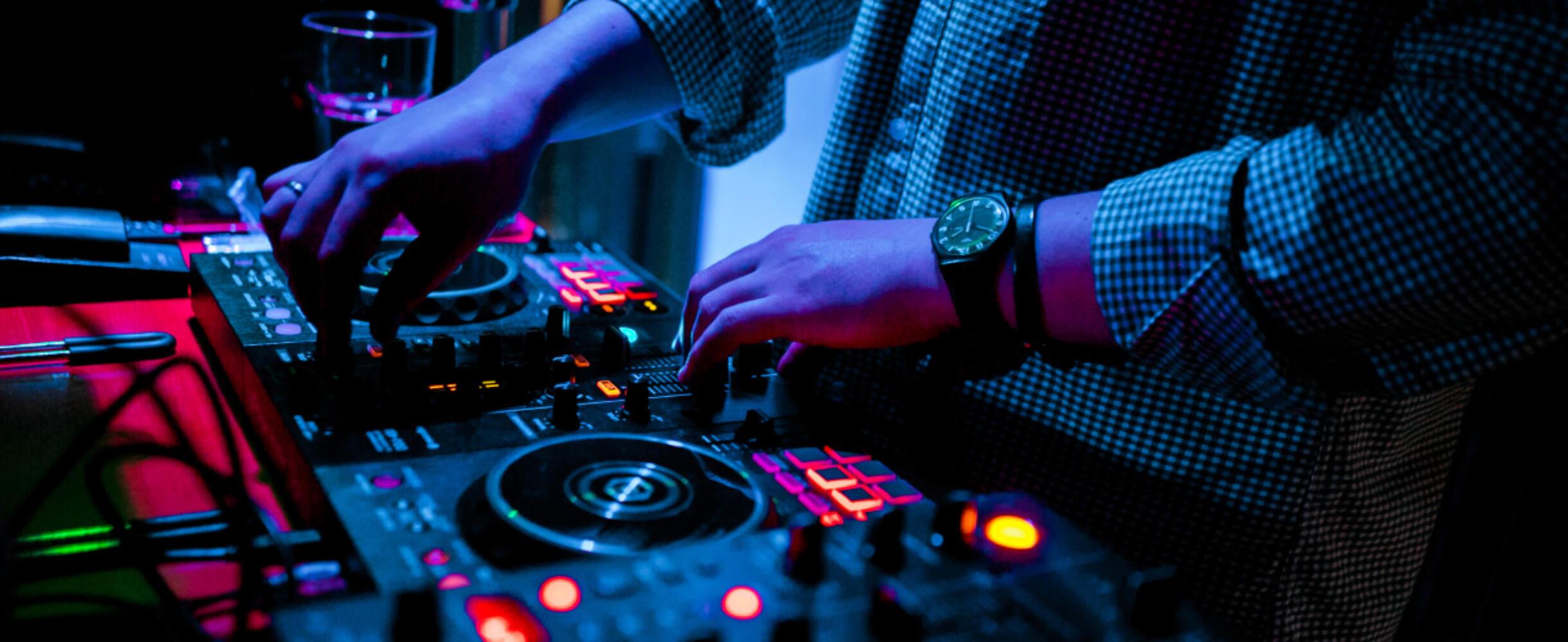A DJ at a mixing desk