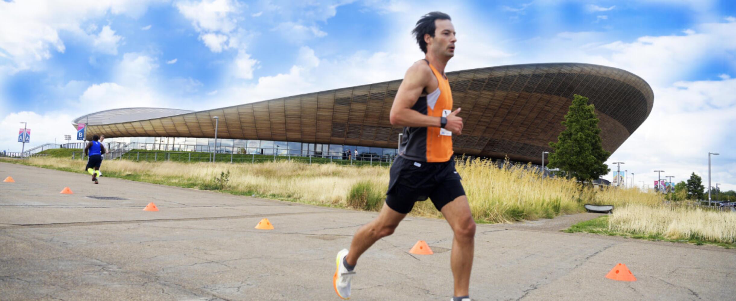 A runner runs past the lee valley velopark