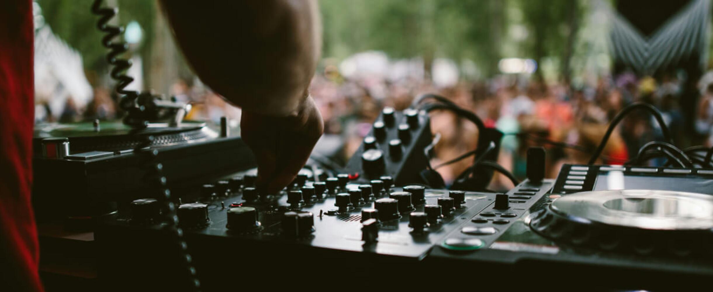 A DJ plays to a crowd