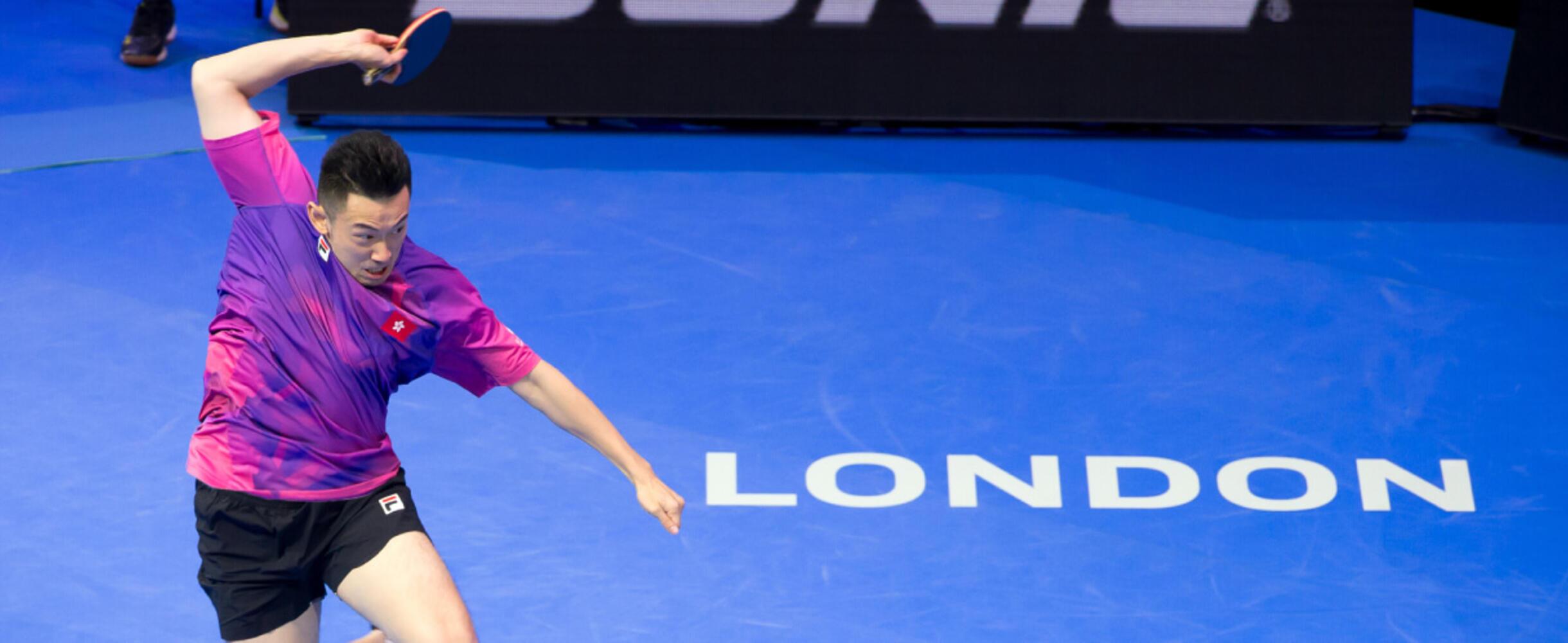 Table Tennis player hits a ball