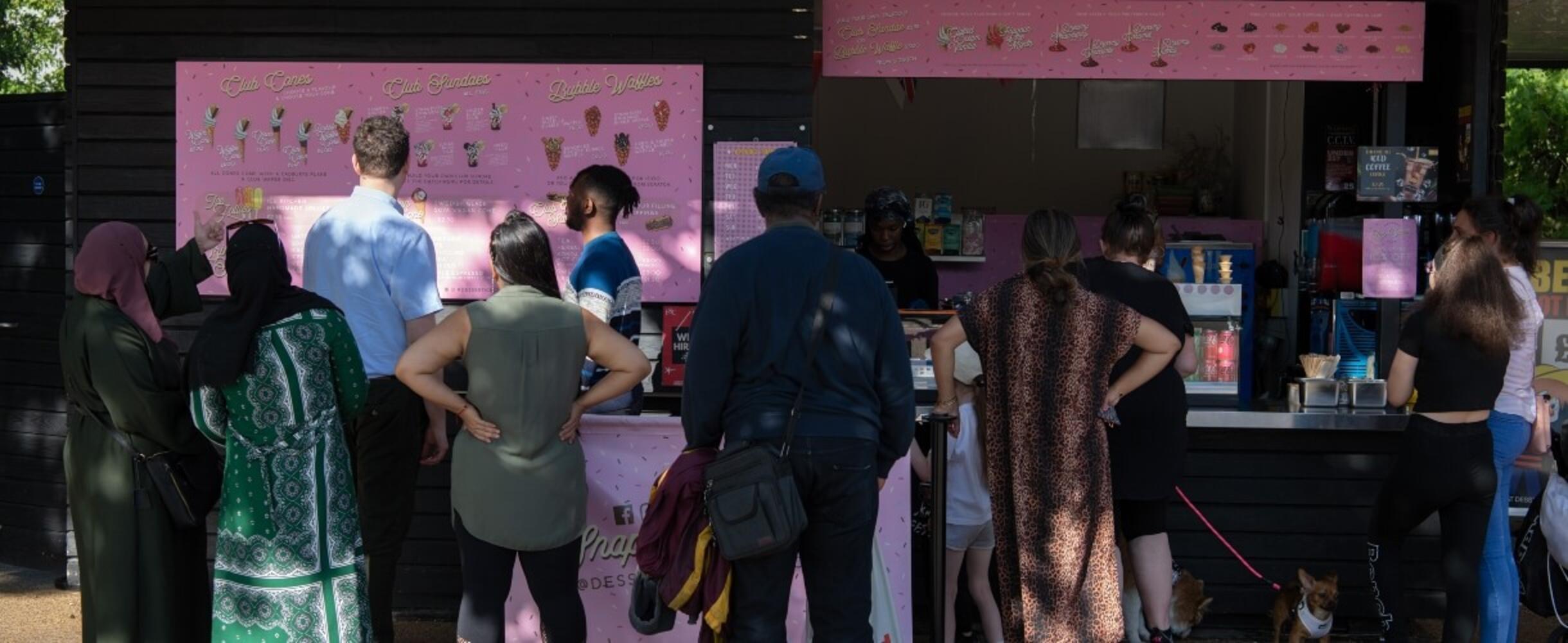 People queuing for ice cream on Queen Elizabeth Olympic Park