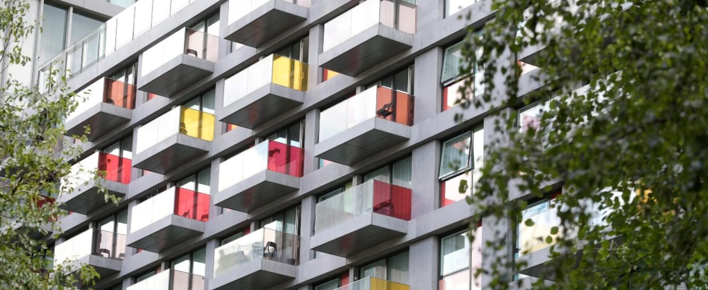 multi-coloured balconies of modern flats
