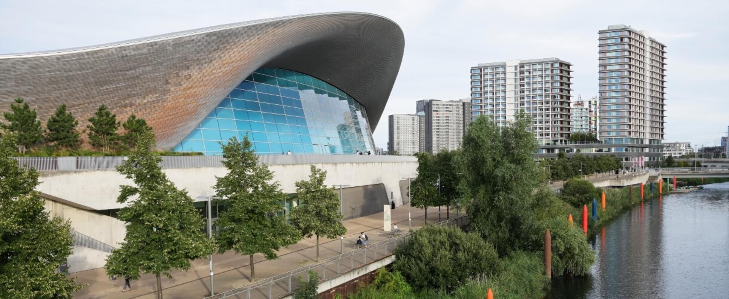 London Aquatics Centre with high-rise flats in the background