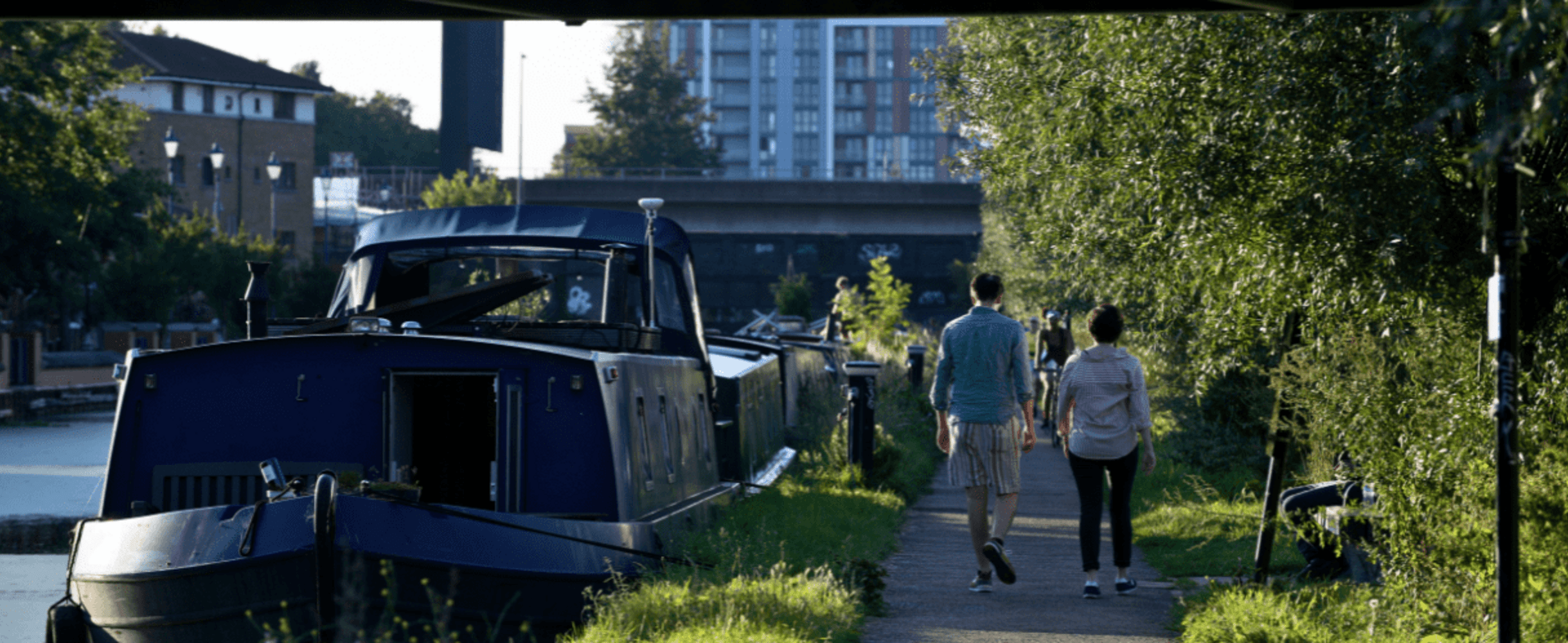 People walking along the River Lee Navigation