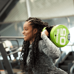 Woman lifting weight in gym