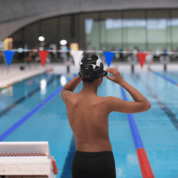 Boy about to dive into pool