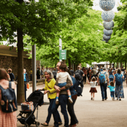 Photo of crowded Tessa Jowell Boulevard as people move through the Park