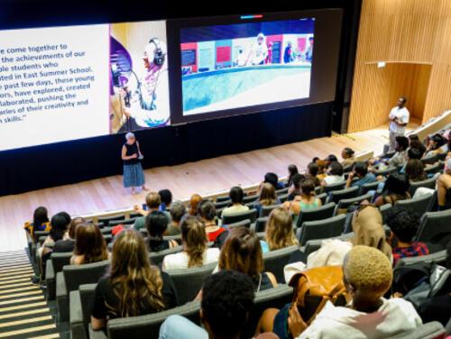 A group of people in a lecture hall at East Summer School