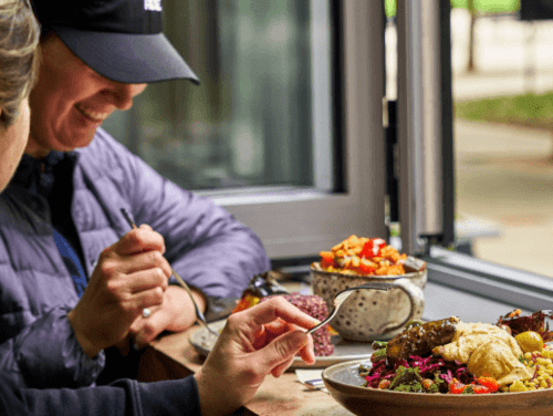 Two people enjoy lunch