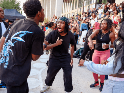 A group of teenagers dancing
