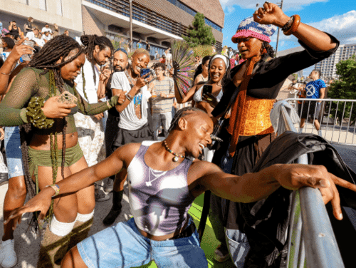 A group of friends dancing