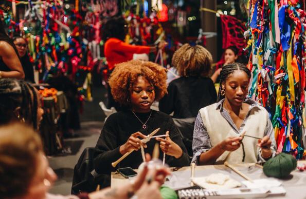 A group of people attend a Black Girls Knit Club workshop @kings_art A group of people attend a Black Girls Knit Club workshop @kings_art