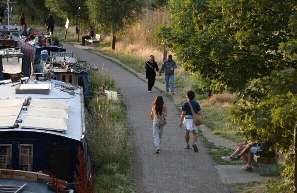 People walking alongside the canal