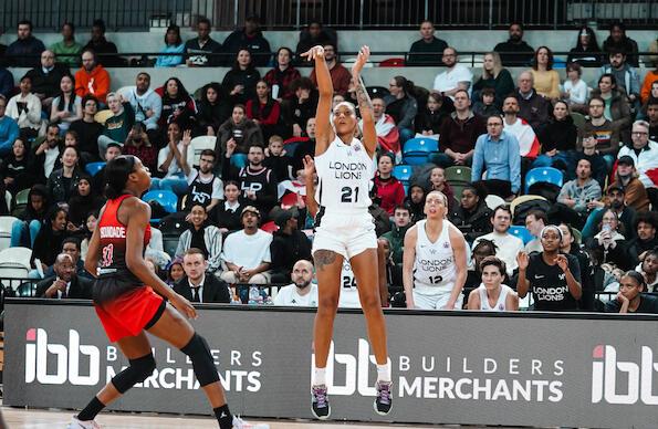 London Lions basketball player shoots for 3 points at copper box arena