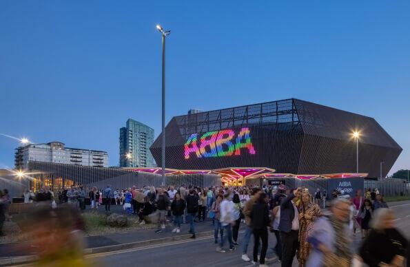 A group of people outside ABBA Arena for ABBA Voyage