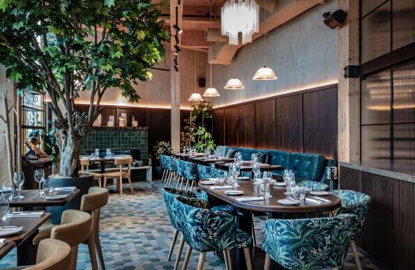 Chic blue dining chairs inside Bread Street Kitchen Chic blue dining chairs inside Bread Street Kitchen