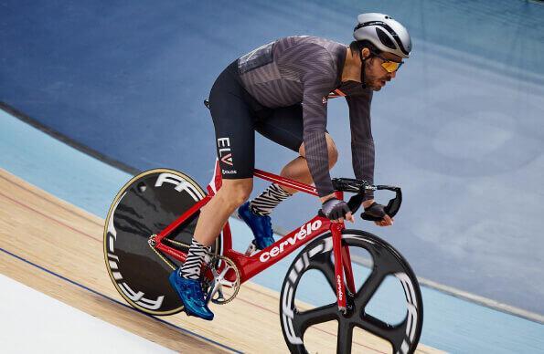 A single cyclist on the velodrome track at Lee Valley VeloPark