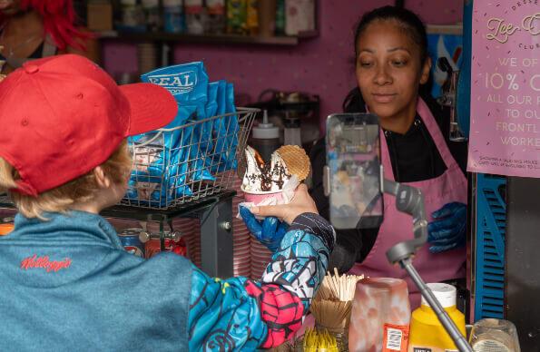 A customer ordering an ice cream sundae A customer ordering an ice cream sundae