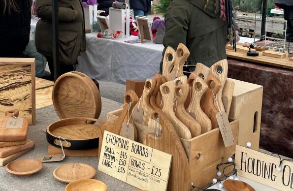 Chopping boards on sale at a christmas market