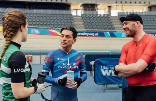 People chatting by the indoor track at Lee Valley VeloPark People chatting by the indoor track at Lee Valley VeloPark