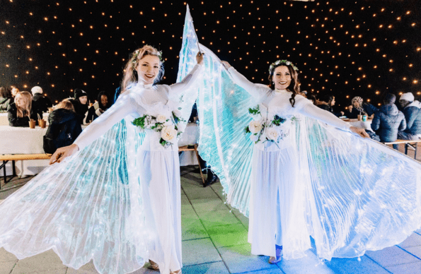 Two people in angel costumes