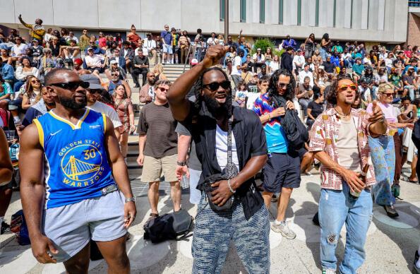 People dance at The Music is Black Festival