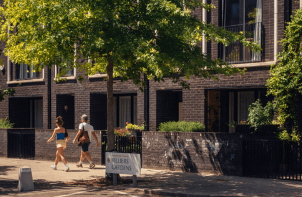 People walking on Chobham Manor 