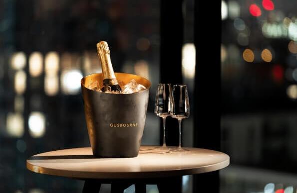 A bottle of champagne in an ice bucket