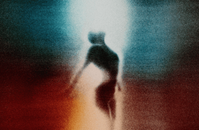 A Dancer looks up in light