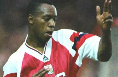 Ian Wright celebrates after scoring a goal