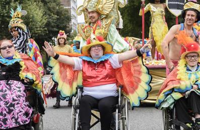 A group of people in folk costume at Hackney Paracarnival