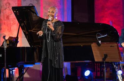 Singer Elaine Delmar performs with a live band